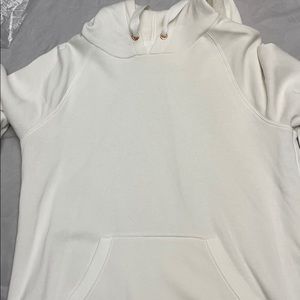 Cream colored hoodie by Xersion. New with tags.